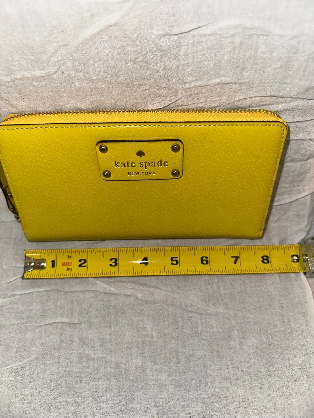 kate spade Yellow Zip-Around Leather Wallet with Logo Plaque
